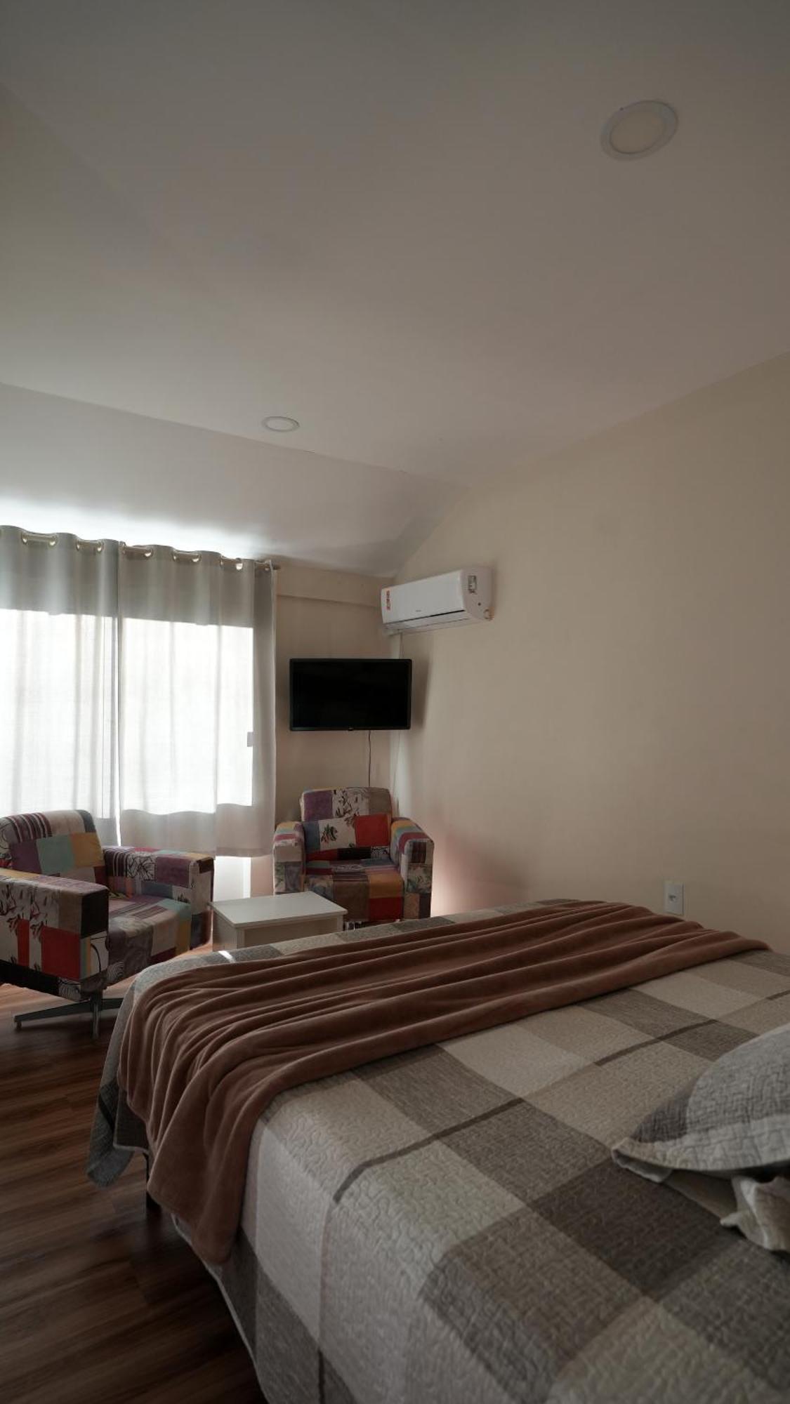 Areia Cristal Inn *